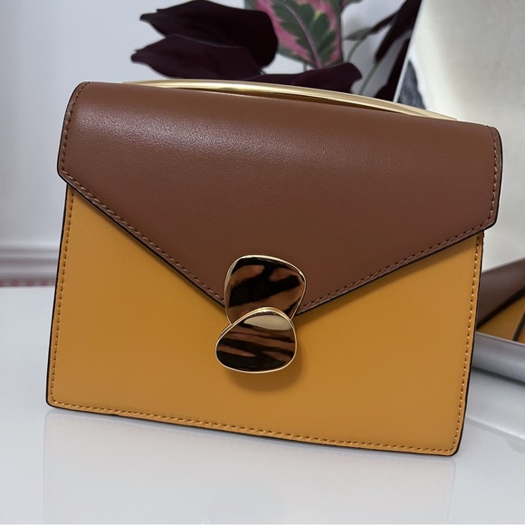 Charles & Keith: Two-Tone Metallic Push Lock Top Handle Crossbody Bag - Picture 2 of 7